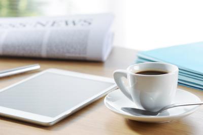 newspaper, tablet, coffee